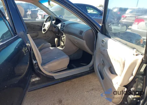 1999 Toyota Corolla Ve из США, поврежденный, VIN 1NXBR12EXXZ290713